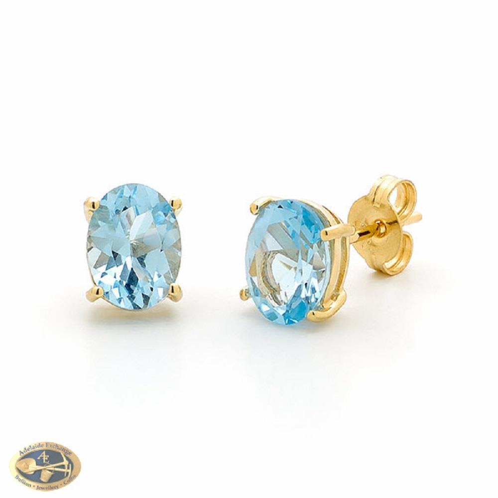 9ct Yellow Gold Blue Topaz 4 Claw Stud Earrings - Adelaide Exchange